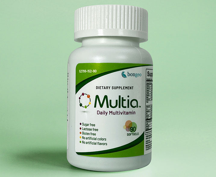 Multia Daily Multivitamin bottle with light green background