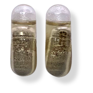 two watery capsules pill for comparison purposes